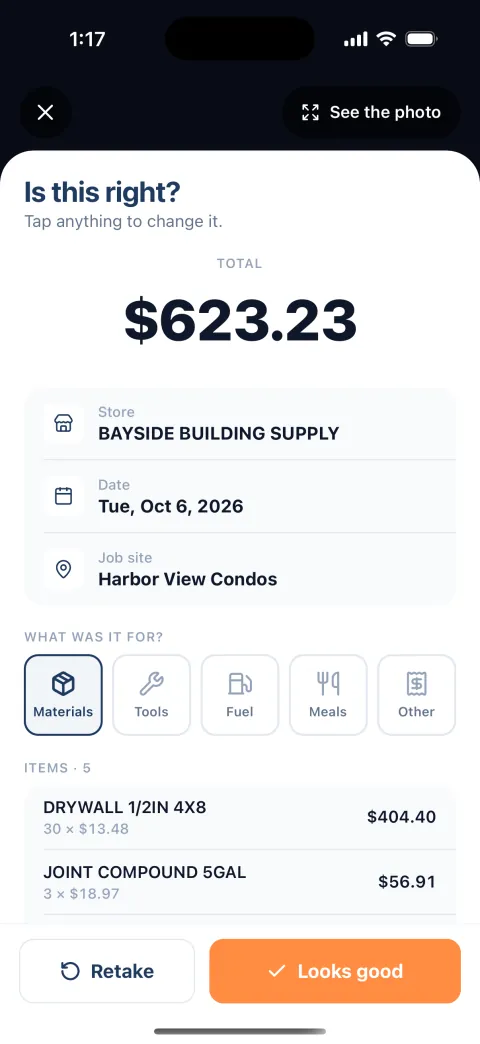 The screen after a receipt is scanned, titled Is this right? Total $623.23. Store: Bayside Building Supply. Date: October 6, 2026. Job site: Harbor View Condos. Materials is selected. Items: drywall, $404.40; joint compound, $56.91. Retake and Looks good buttons.